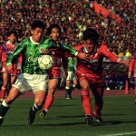 TOKYO, JAPAN - JANUARY 09:  (EDITORIAL USE ONLY) Kazuyoshi Miura of Verdy Kawasaki and Eiji Gaya of Kashima Antlers compete for the ball during the Suntory Championship first leg match between Kashima Antlers and Verdy Kawasaki at the National Stadium on January 9, 1994 in Tokyo, Japan.  (Photo by Etsuo Hara/Getty Images)